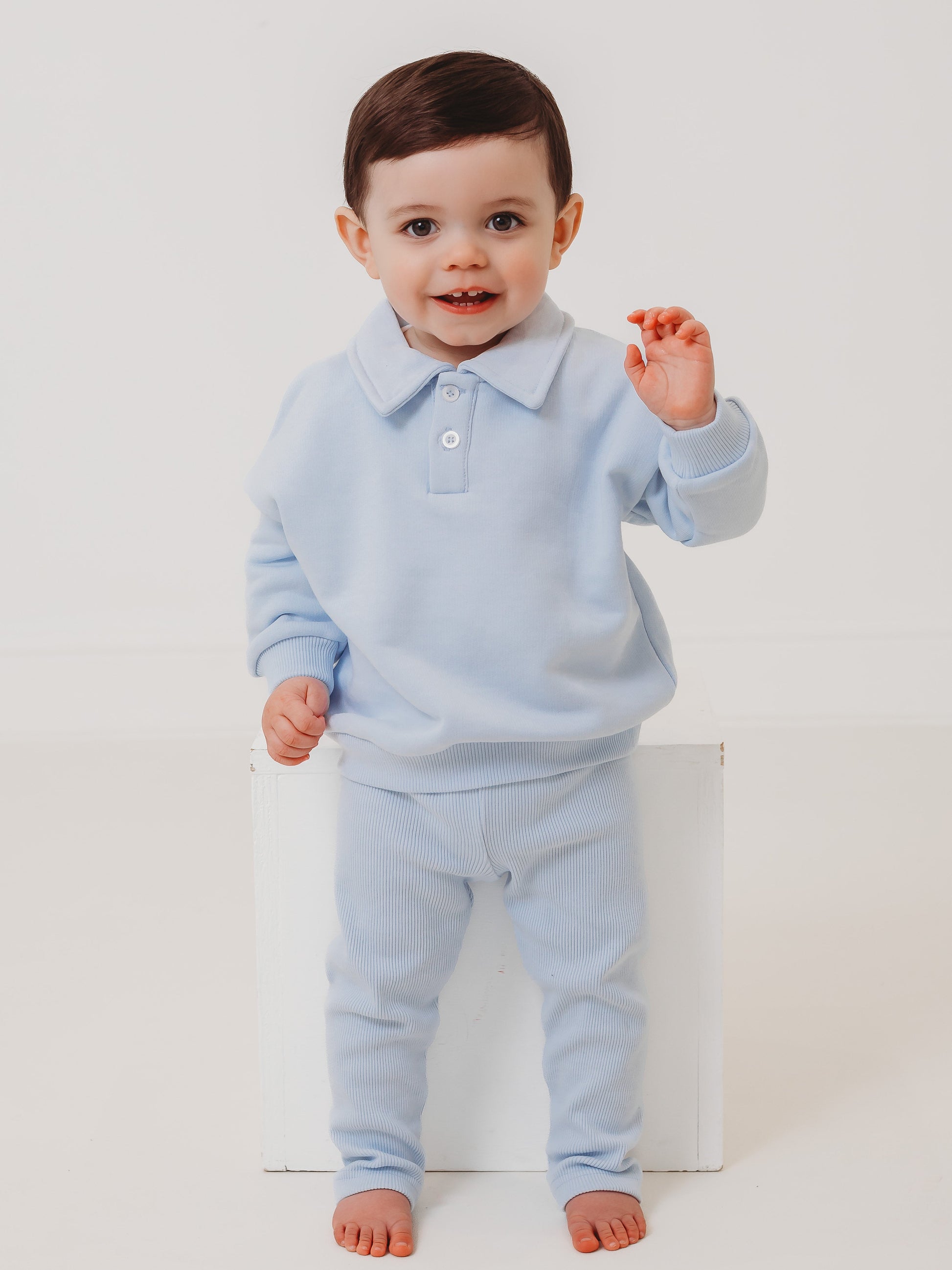 Light blue polo collar top and ribbed leggings set, toddler play stance