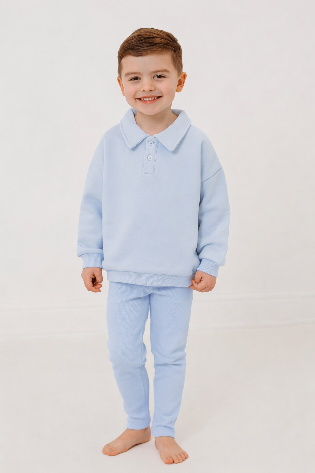 Light blue polo collar top and ribbed leggings set, front view standing