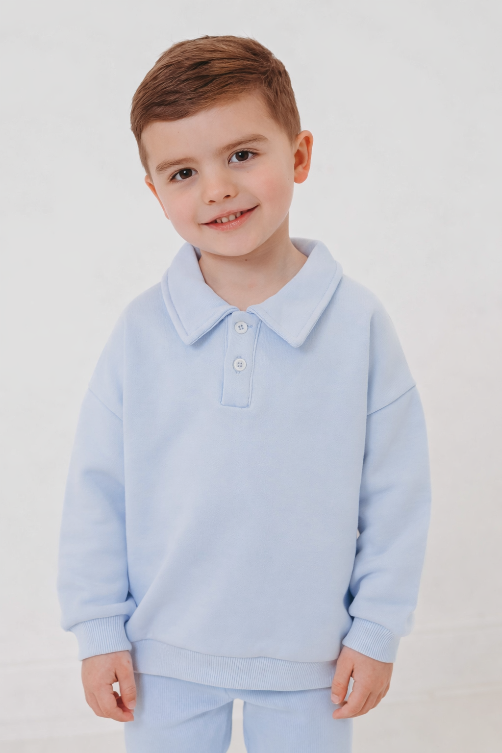 Light blue polo collar top and ribbed leggings set, close-up front view