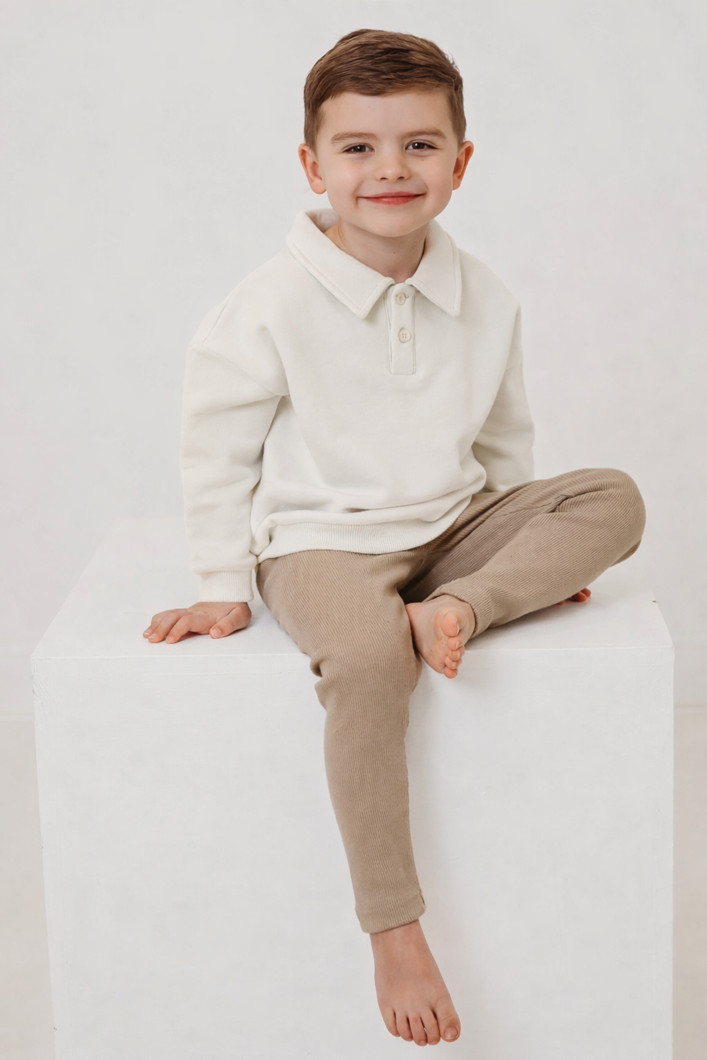 Cream polo-collar long-sleeve top with beige ribbed leggings, toddler set