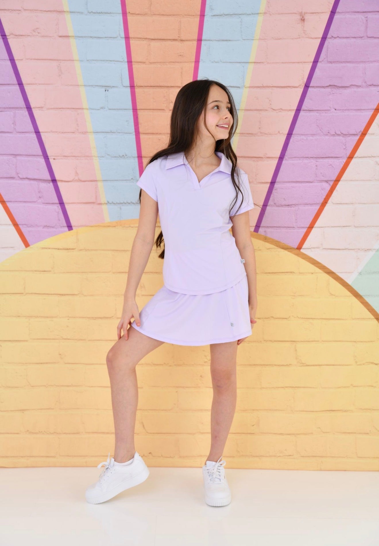 Lilac skort set with collared polo shirt and pleated skirt-style skort