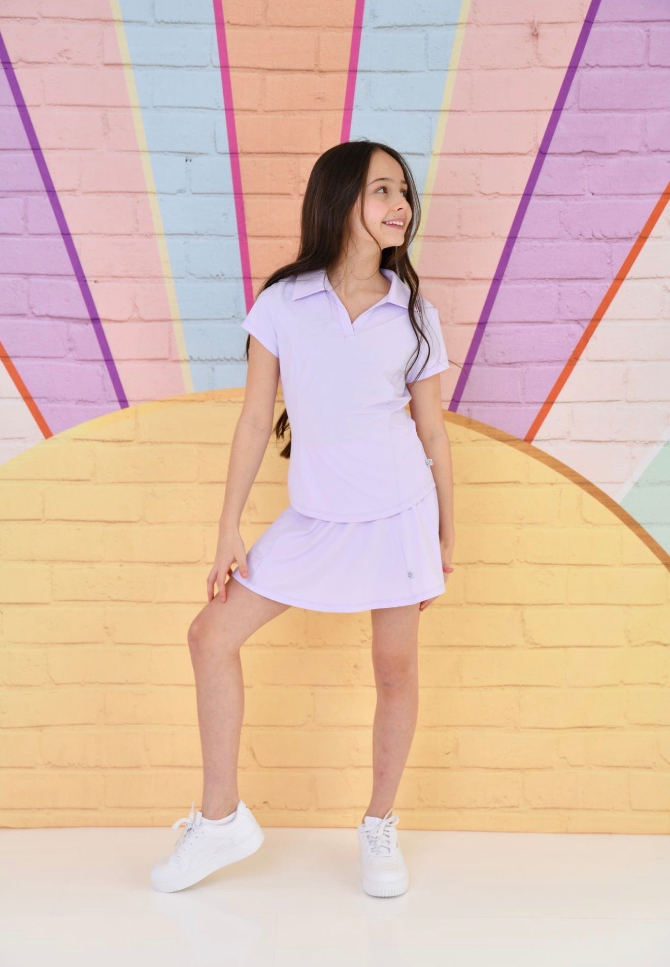 Lilac skort set with collared polo shirt and pleated skirt-style skort