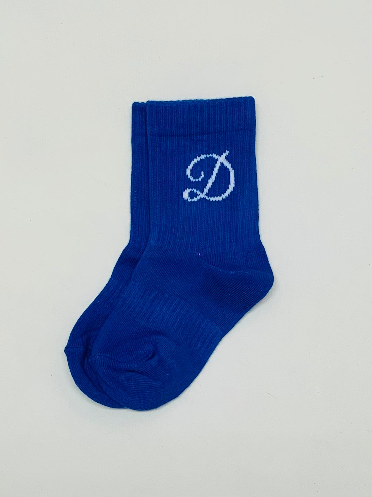 Dolly Sport Socks in Royle Blue: blaue Socken mit weißem D-Logo
