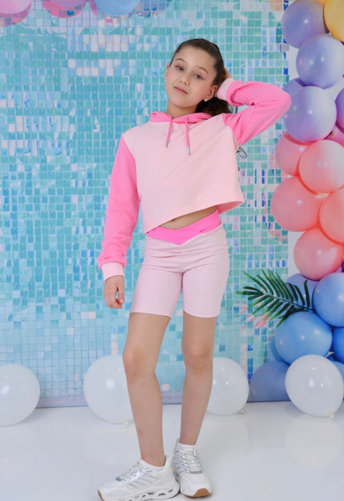 Girls pink hooded sweatshirt with drawstring ties and kangaroo pocket