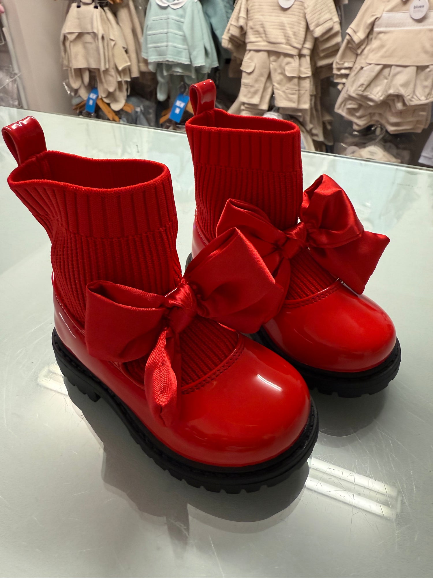 Girls red patent chunky sock boots with bow and ribbed cuffs