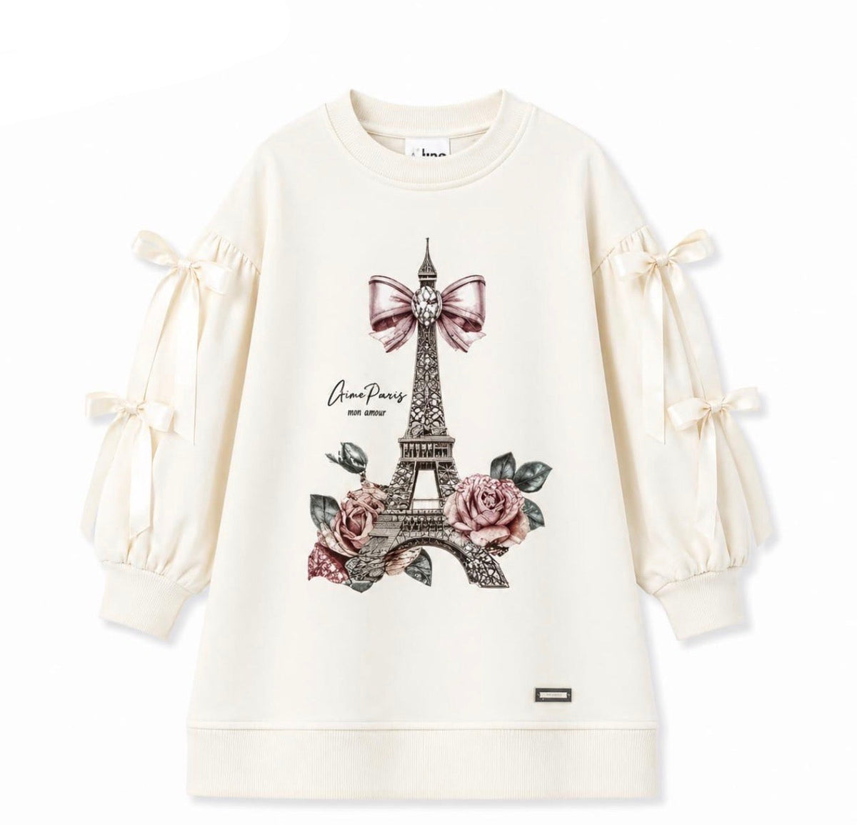 Cream long-sleeve dress with bow-tied puff sleeves and Eiffel Tower graphic front