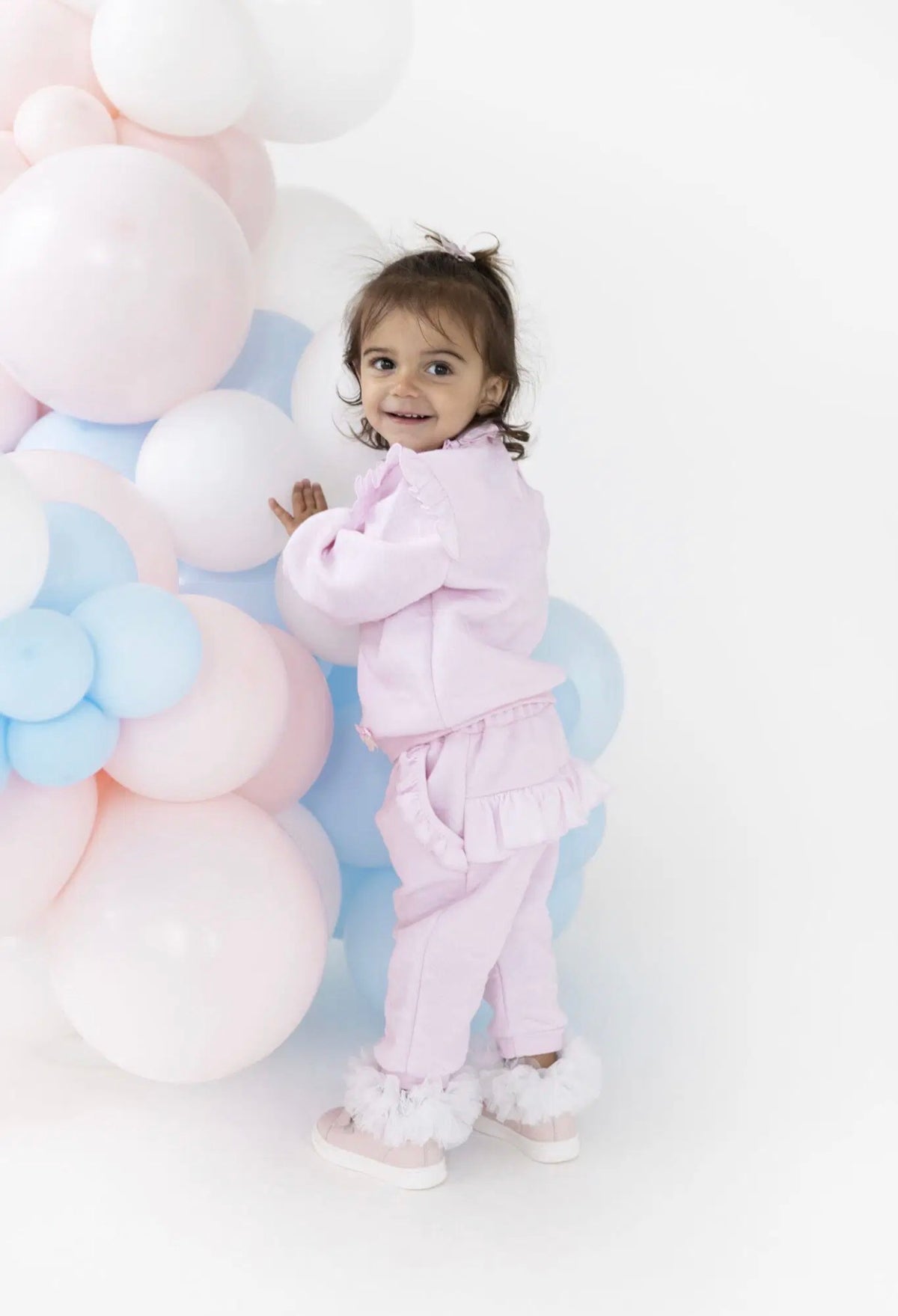 Pink baby girls jogger set with ruffled long-sleeve top and matching pants