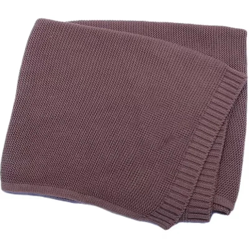 Baby knitted swaddle blanket in cocoa brown with ribbed side trim