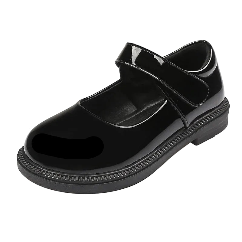 Black shiny shoe with a strap on a white background