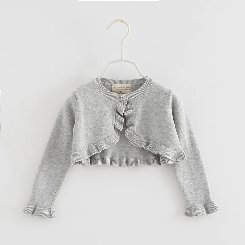 Gray toddler knit cardigan with long sleeves, bow at neckline and ruffled shoulders