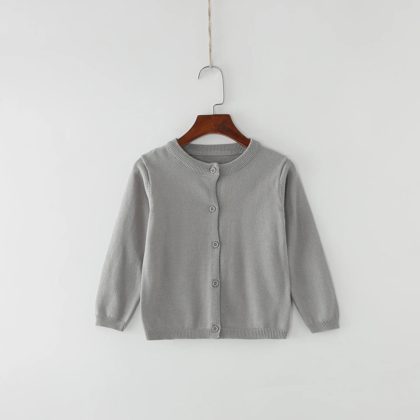 Gray toddler knit cardigan with long sleeves, button-front and ribbed cuffs