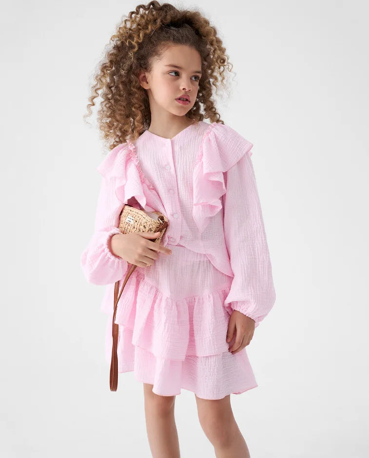 Girls pink ruffle smock shirt and tiered skirt set with layered skirt hem
