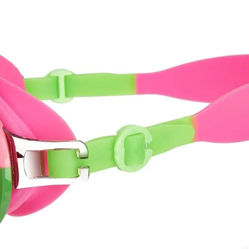 Pink and green heart goggles close-up with adjustable strap and silver buckle