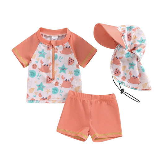 Children's swim set with rash guard, shorts, and hat on a white background
