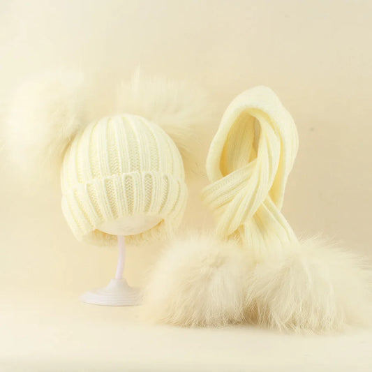 White knit beanie hat with large pom pom and fluffy scarf set