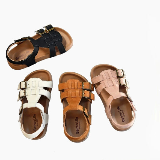 Kids buckle strap sandals in Black, White, Tan & Pink—adjustable buckle straps