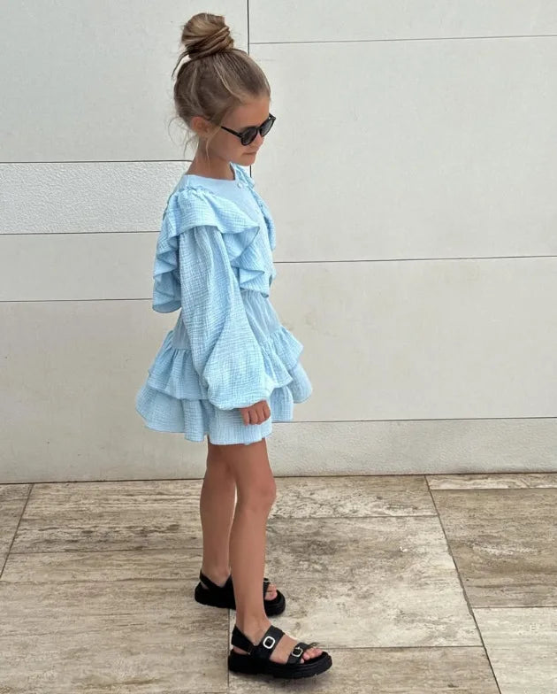 Powder blue ruffle smock skirt and shirt set, long puff sleeves and tiered hem