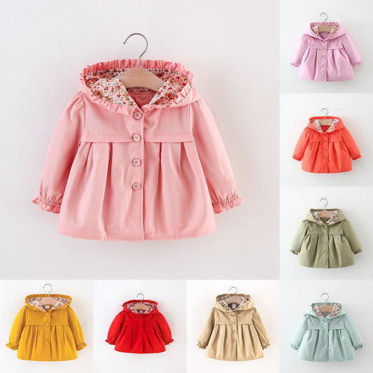 Pink hooded baby jacket with button front, ruffled hood, long sleeves, floral lining.