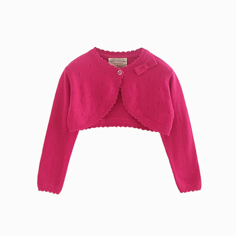 Kids knit cardigan, bright pink long sleeves, cropped with ruffle wrap front and button