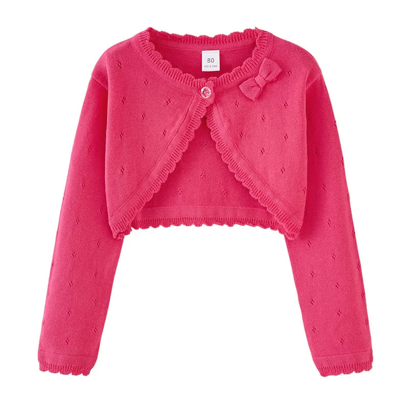 Fuchsia pink toddler knit cardigan with bow detail at neckline and scalloped trim