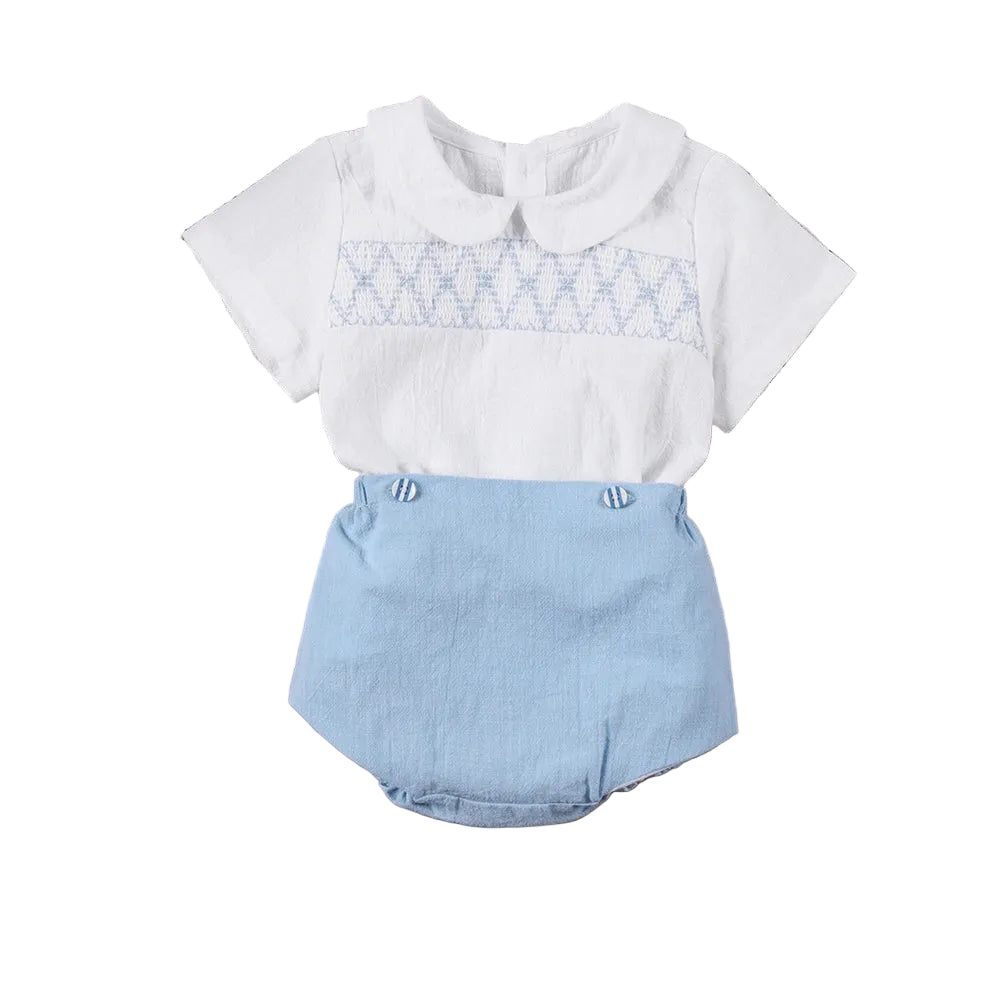 Baby outfit with white top and blue shorts with smocked detail