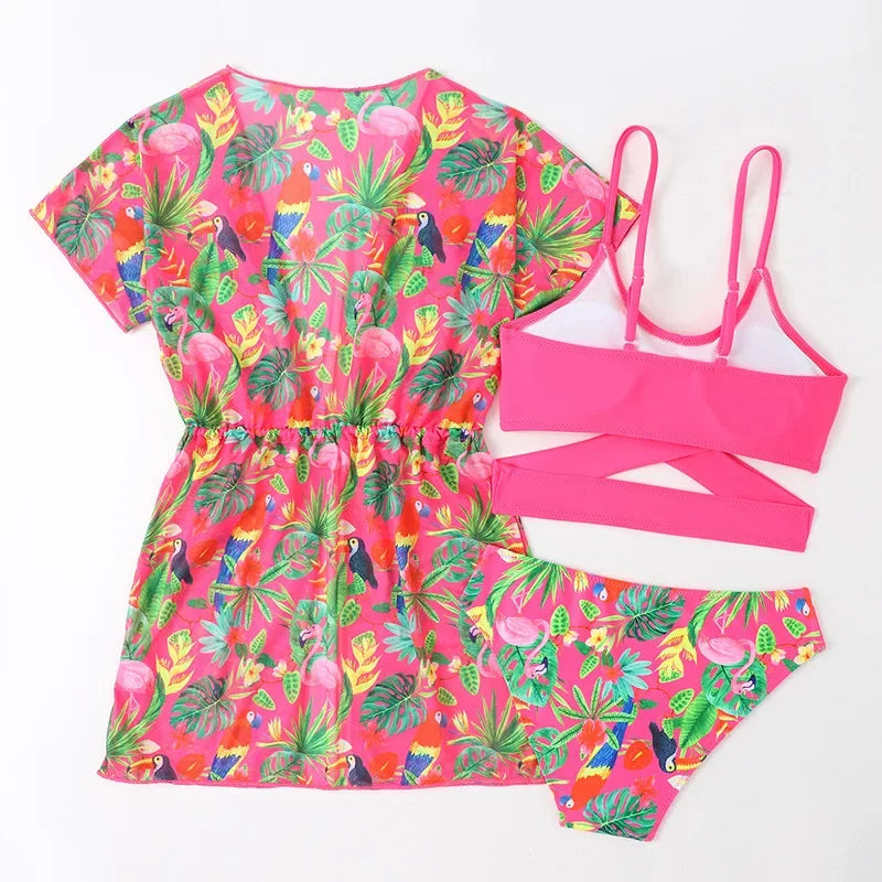 Tropical-themed dress set with pink top and shorts on a white background