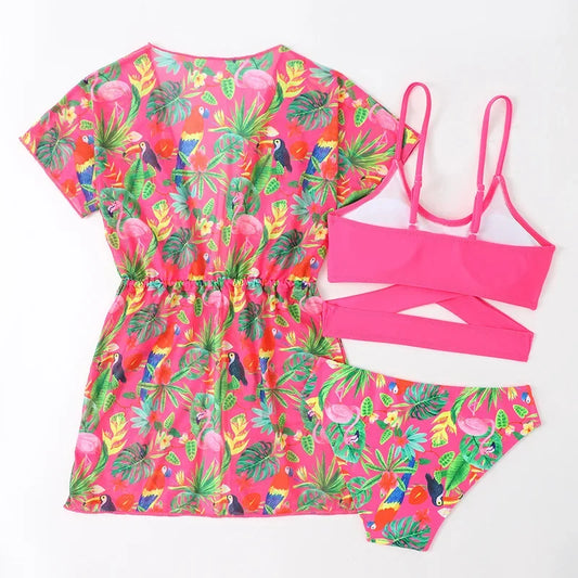 Tropical-themed dress set with pink top and shorts on a white background