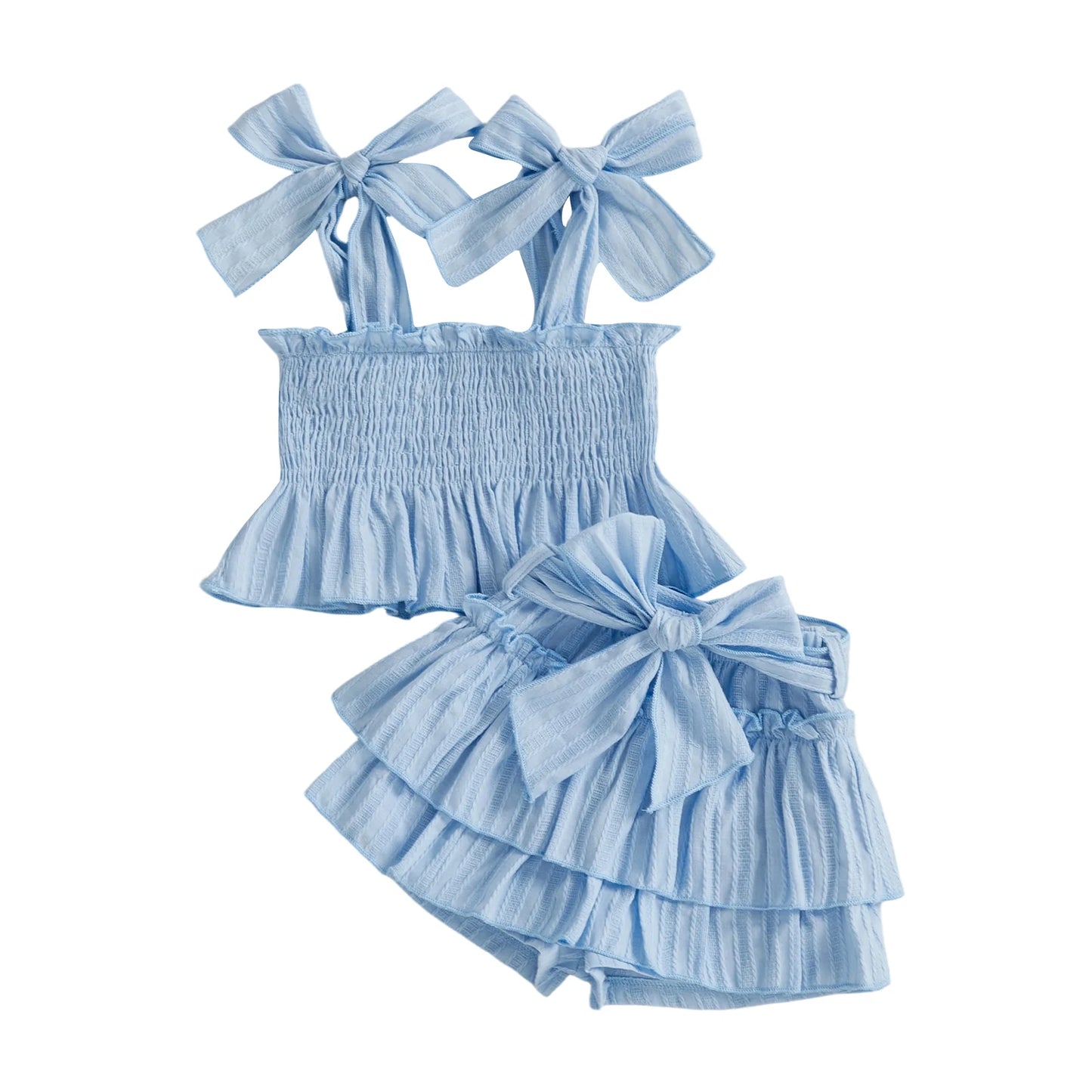 Sky blue bow shorts set flat lay: ruffled peplum cami and tiered bow shorts