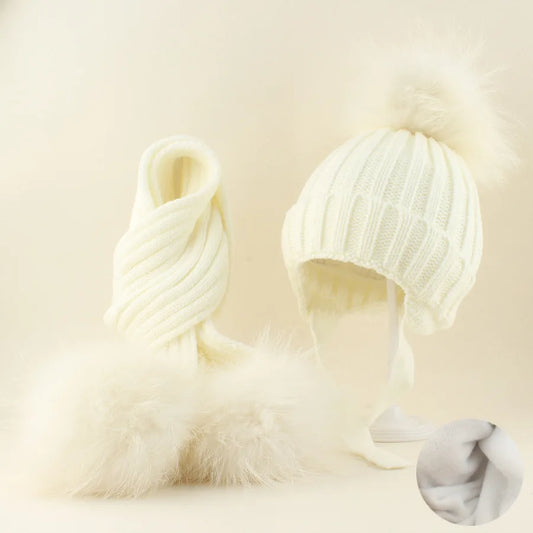 White knit raccoon hat and scarf set with pom and looped scarf, matching stripes