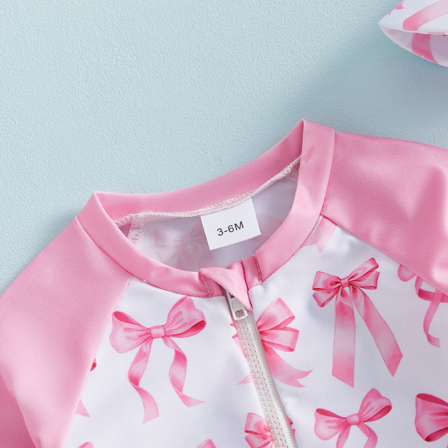 Girls Bow Print Long Sleeve Swim Romper with Sun Hat (1-3 Years) *Preorder