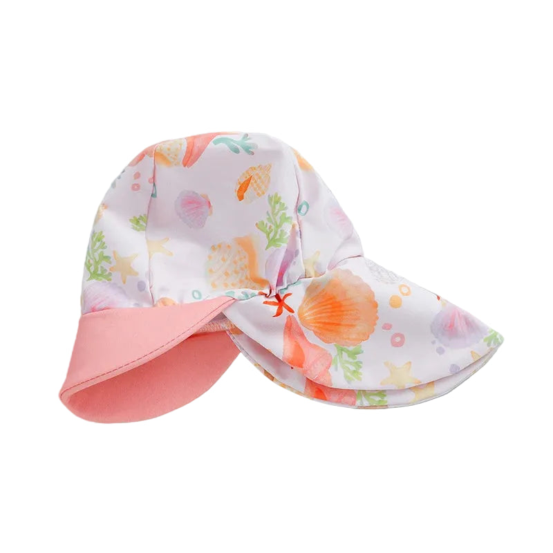 Colorful children's sun hat with sea-themed pattern on a light blue background