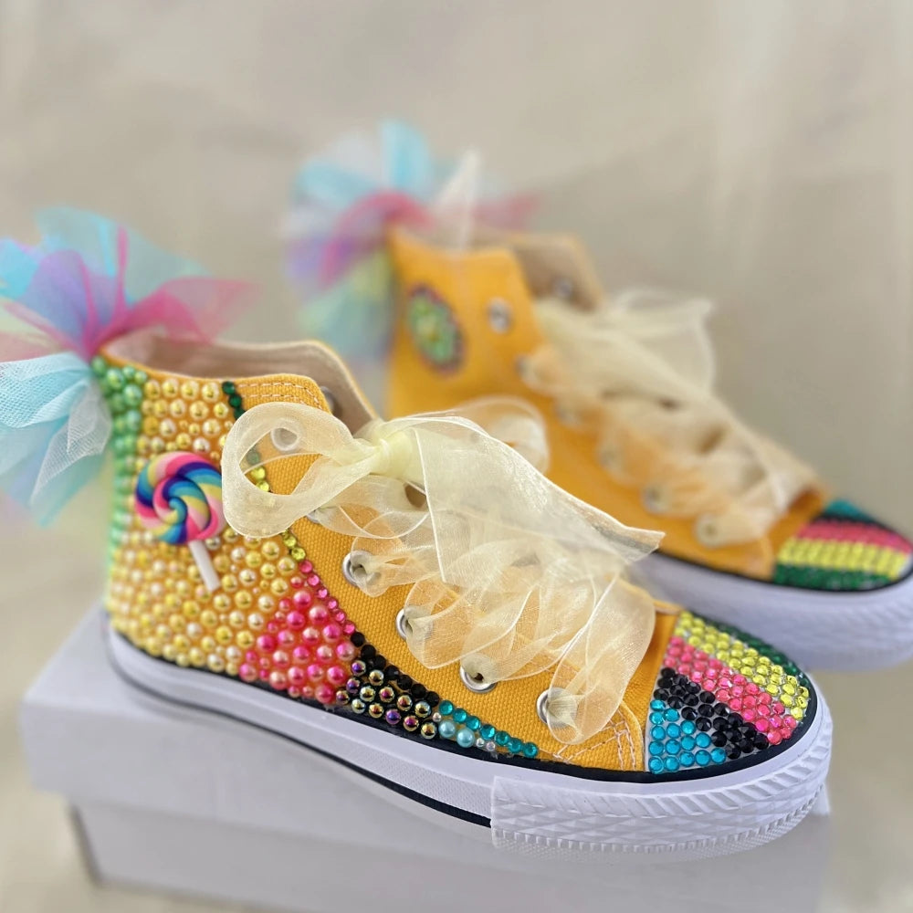 Dolly Bling canvas high-top sneakers with rainbow rhinestone trim and tulle bow