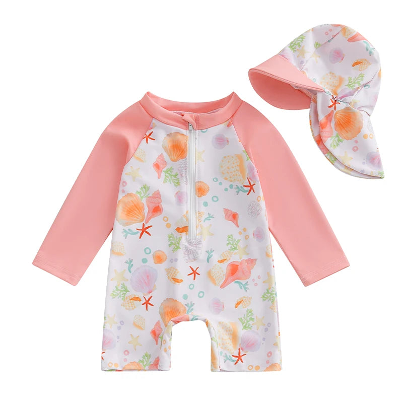 Baby swimsuit with pink long sleeves and floral hat on a white background