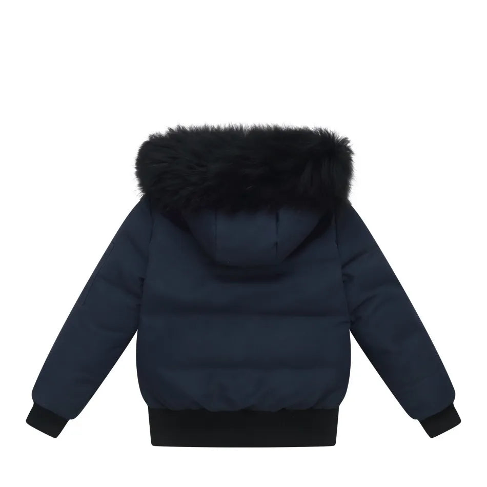 Dark blue puffer jacket with fur hood on a white background