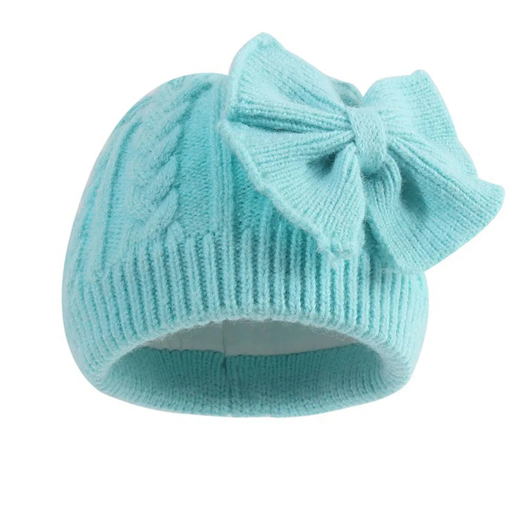 Sky blue knit baby beanie with bowknot and folded brim