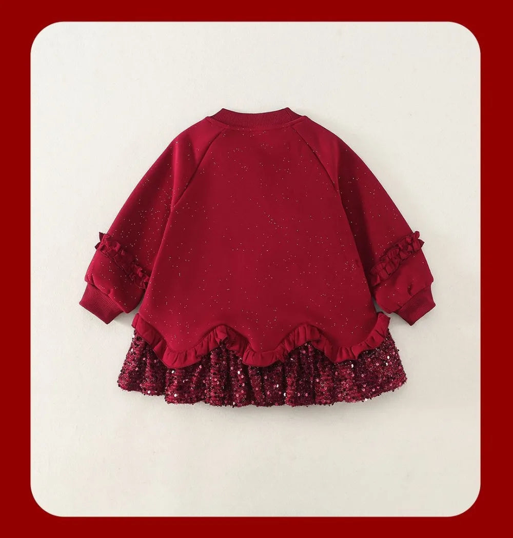 Red girls dress back view with glitter ruffle hem and long cuff sleeves