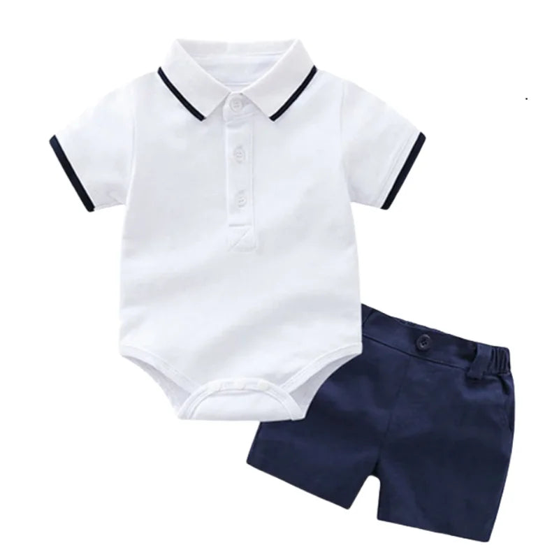 White polo shirt and navy shorts set on a white background