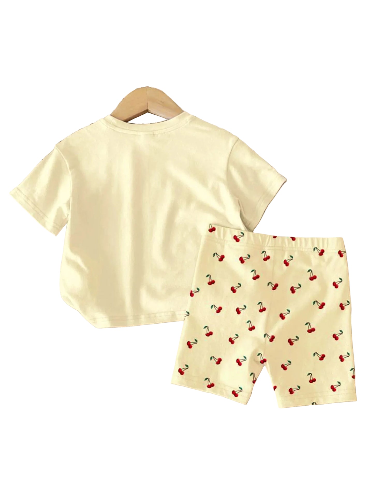 Girls cherry print summer short set: back of pale yellow T-shirt with matching cherry shorts.