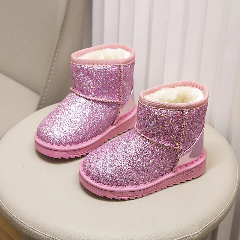 Kids pink glitter snow boots with thick faux-fur lining and chunky rubber sole