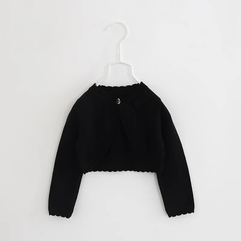 Kids knit cardigan, dark black long sleeves, cropped with ruffle front and button