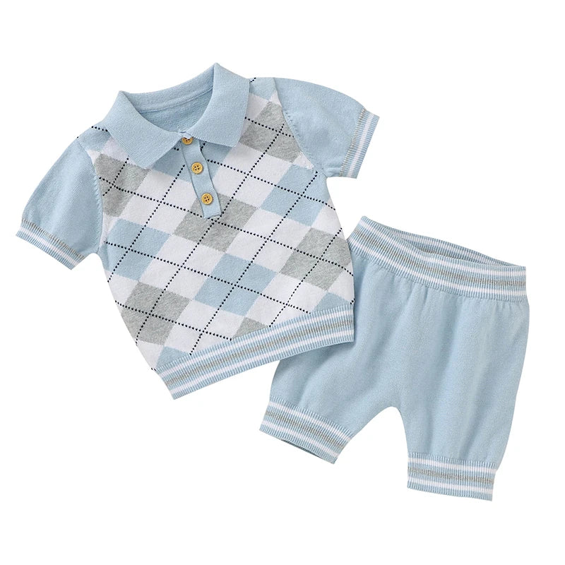 Baby outfit with checkered shirt and shorts on a white background