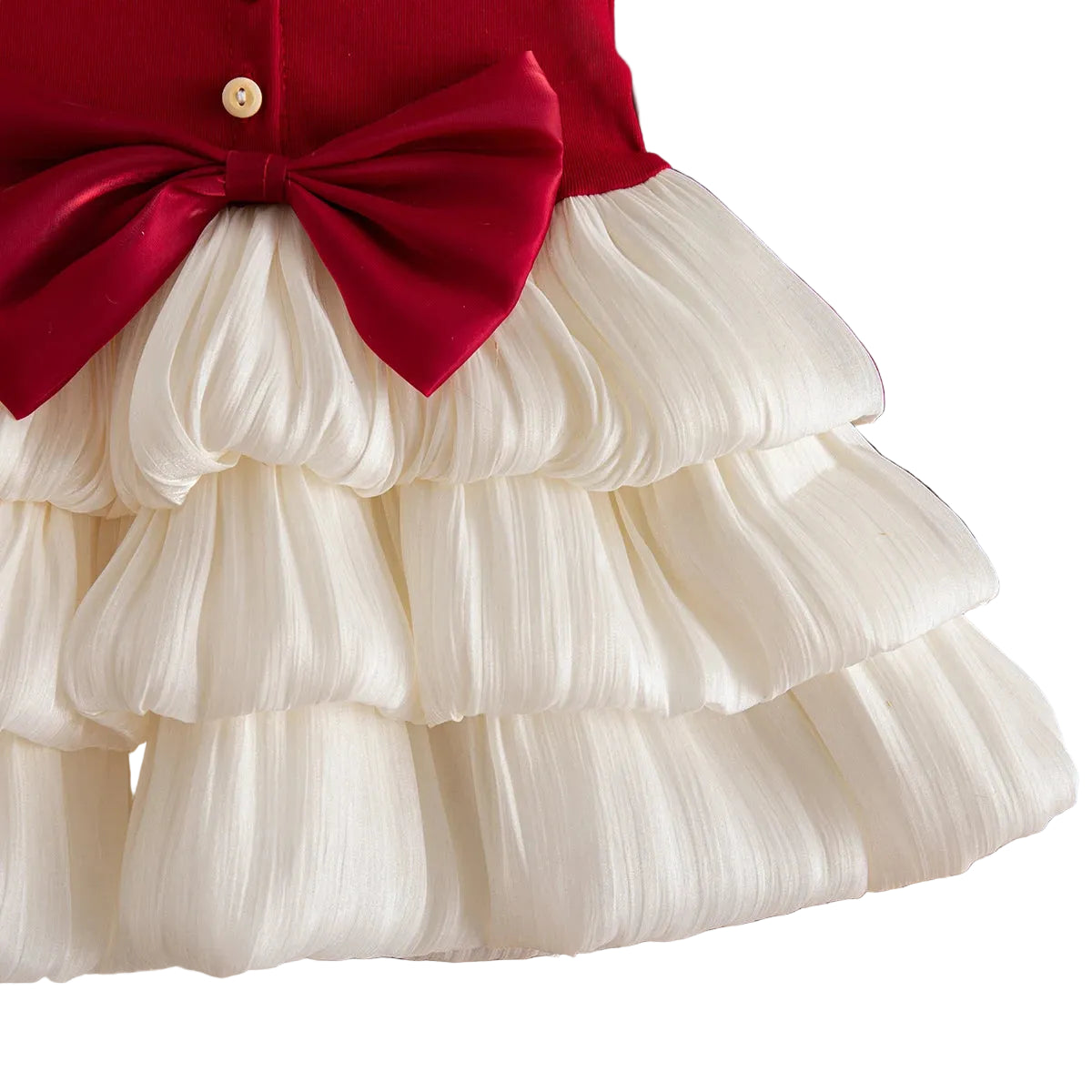 Red dress with large bow and layered white ruffle skirt