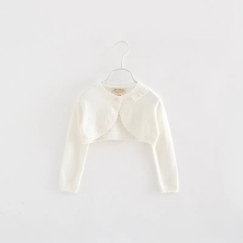 White toddler knit cropped cardigan with bow detail at neckline