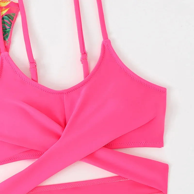 Pink bikini top on a white background