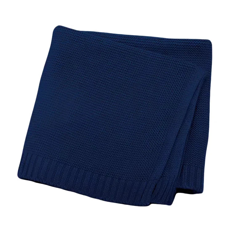 Baby knitted swaddle blanket in dark navy blue with ribbed trim edge