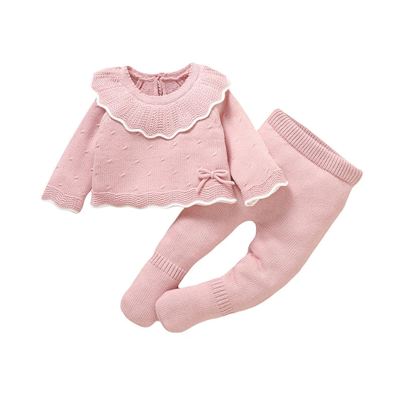 Pink 2-piece infant sweater and leggings set with scalloped ruffle and bow