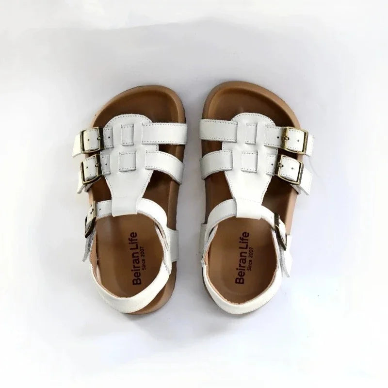 Kids white leather sandals with two buckle straps and open-toe design
