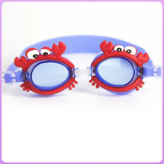 Red and blue swimming goggles with a 3D crab design on the frame and a blue adjustable strap, featuring anti-fog lenses, UV protection, and a leakproof fit.