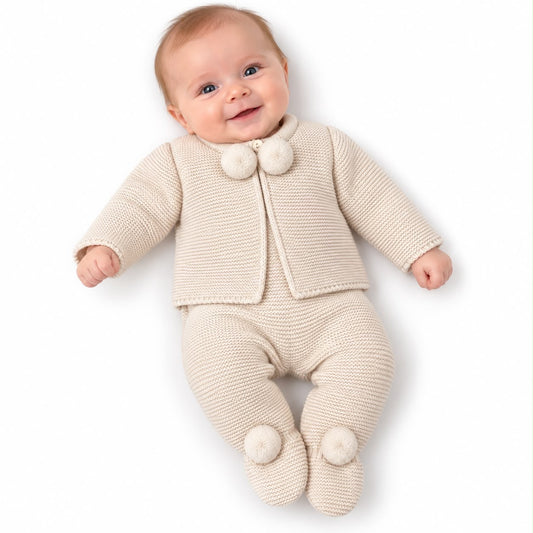 Kids beige pom-pom jacket and pants set with fluffy pom accents on cuffs