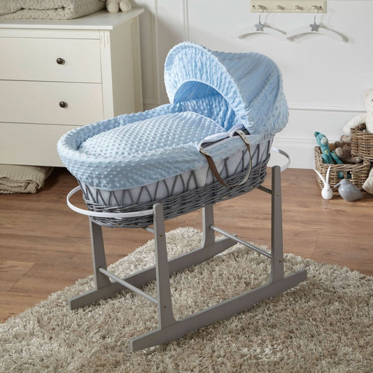 Blue wicker Moses basket with stand, blue padded mattress and soft hood